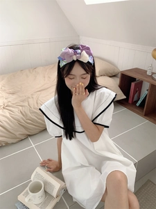 Model met een dubbellaagse 3D organza strik haarband in een vintage Koreaanse stijl.