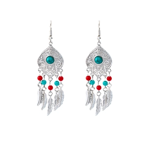 Bohemian silver drop earrings with turquoise stones, beads and feather pendants