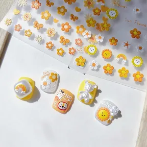 3D embossed nail art stickers featuring sunflowers, bears, and rainbows on white background