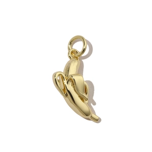 Detailed close-up of a creative gold peeled banana pendant with a polished metallic finish