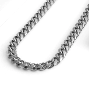 Close-up of silver stainless steel Cuban link necklace showing polished metal texture