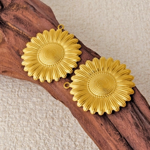 French vintage 304 stainless steel sunflower pendants on rustic wood for DIY jewelry making