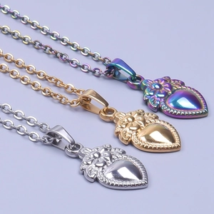 Polished 18k gold plated stainless steel heart necklaces with floral relief in three colors