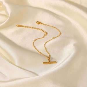 18K gold plated titanium anklet with minimalist T-bar pendant and beaded chain design