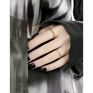 Two-piece minimalist silver ring set with textured gold accents and zircon stones