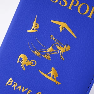 Detail of blue textured PU leather passport cover with gold foil sport silhouettes