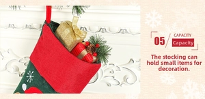 Close-up of linen Christmas stocking with snowflake embroidery hung on a fireplace