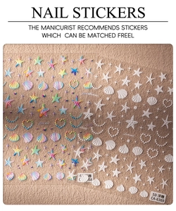 Detailed 5D embossed nail stickers featuring colorful gradient shells and starfish