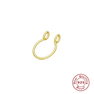Detail of 925 sterling silver U-shaped nose ring with gold finish and quality hallmark