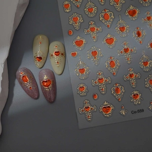 Baroque style nail art stickers with gold embossed frames and 3D heart gems and nail tips