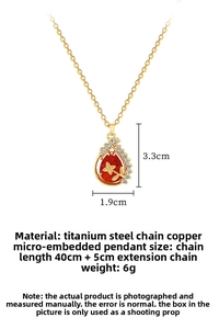Detailed view of teardrop necklace with red pear-cut stone and dimensions of 3.3x1.9cm