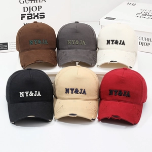 Vintage washed baseball caps set with 3D NY&JA embroidery and distressed brim details