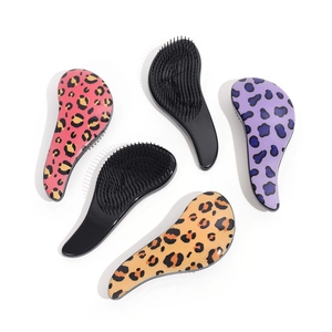 Set of leopard print and black detangling hairbrushes for wet and dry hair care