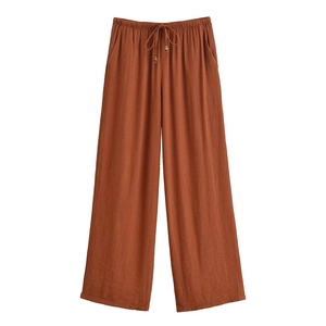 Braune Hose mit weitem Bein, elastischem Kordelzug und dekorativen Holzperlen