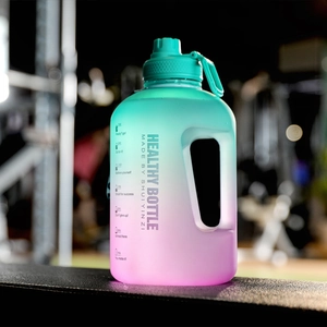 Detail of gradient sports water bottle with time markers in a fitness setting