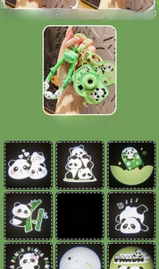 Macro shot of green panda camera keychain showing colorful cartoon projector light effects