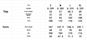 Tableau des tailles détaillé pour l'ensemble pantalon et haut brodé sans manches