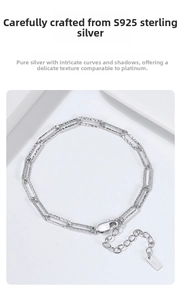 Detailed macro view of S925 sterling silver paperclip chain bracelet with hallmark