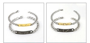 Détail de bracelets de couple en acier inoxydable avec charmes Real Love et One Life
