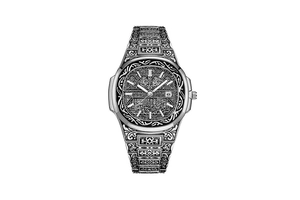 Close-up of engraved stainless steel watch band and dial with intricate floral pattern
