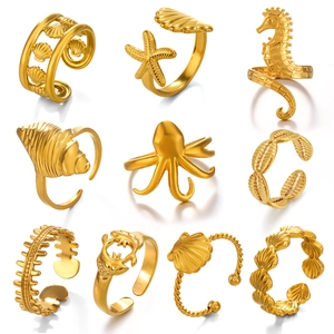 Gold stainless steel ocean-themed open rings featuring sea horse starfish and shells