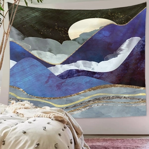 Bedroom wall decor featuring a modern abstract mountain landscape tapestry with moon and stars