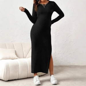 Slim fit black maternity dress with long sleeves and side split in ribbed knit fabric