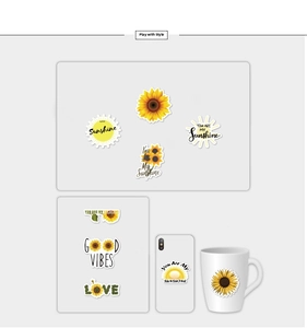 Detail of waterproof sunflower stickers applied on phone case and ceramic mug