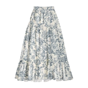 Maxi skirt with blue floral print featuring a high waist design and tiered ruffled hem