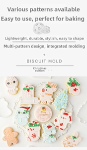 Detailed view of white plastic Christmas biscuit molds featuring snowman and deer shapes