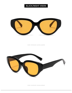 Detail of cat eye night vision sunglasses with black frame and yellow lenses