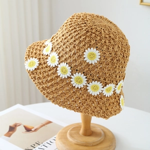 French retro hand-woven straw bucket hat with colorful floral daisy pattern accents