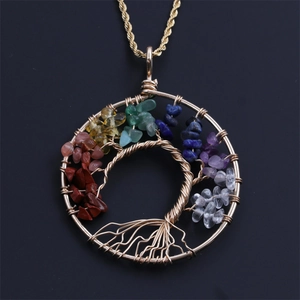 Golden Tree of Life necklace with colorful chakra crystals on a twisted rope chain