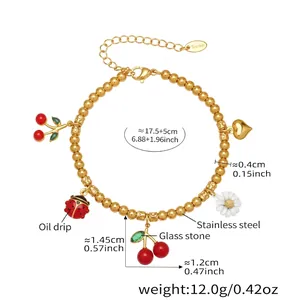 Détails du bracelet perlé avec pendentifs cerise, marguerite et coccinelle en plaqué or 18k