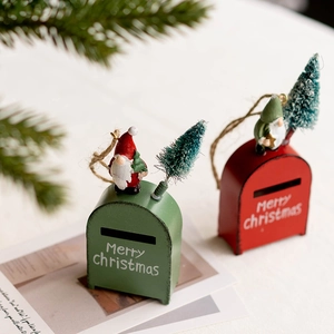 Red and green Christmas tree mailbox ornaments with Santa and miniature tree decor