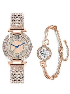 Coffret montre et bracelet luxueux en or rose avec strass pour femme sur fond blanc
