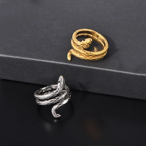 Minimalist snake-shaped stainless steel rings in gold and silver with scale textures