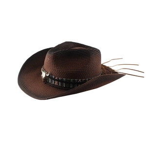 Detail of dark brown woven cowboy hat with ethnic band and silver bull head charm