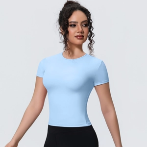 Detail of light blue slim fit sports t-shirt showing smooth breathable fabric and crew neck