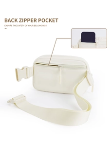 Detail showing the secure back zipper pocket on the nylon checkerboard belt bag