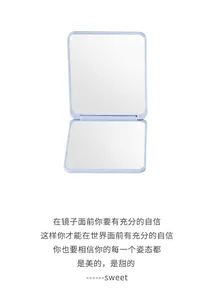 Detail of light purple folding makeup mirror with compact square rounded edge design