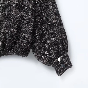 Women's black and silver tweed jacket with metallic threads and silver buttons