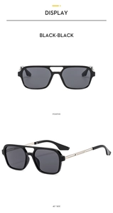 Detail view of vintage double-bridge aviator sunglasses with hollow metal temples