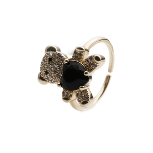 Detail view of gold bear ring with black heart stone and pave cubic zirconia accents
