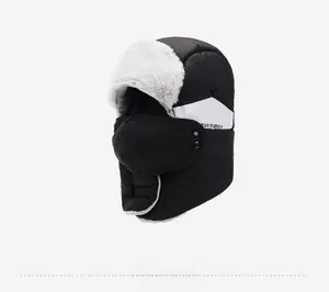 Detail view of winter trapper hat with windproof fabric and thick white fleece lining