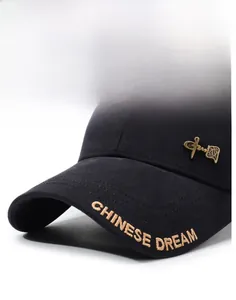 Detail of golden Chinese character badge and embroidery on black cotton baseball cap