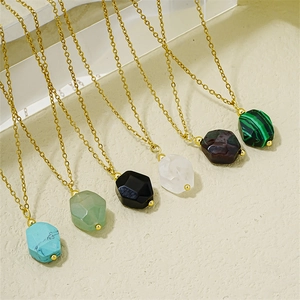 Close-up of hexagonal colorful natural stone pendants with gold chain necklaces in six colors