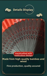 Detailed macro of black bamboo fan ribs with intricate hollow carvings and red fabric