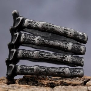 Gothic style bone structure open ring in vintage silver finish on wood bark