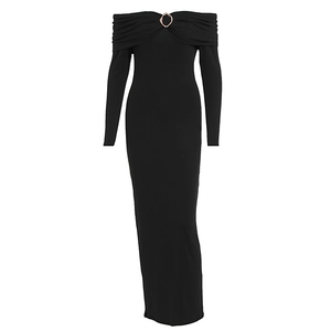 Detail of off-shoulder black maxi dress with elegant pleats and gold metal ring accent
